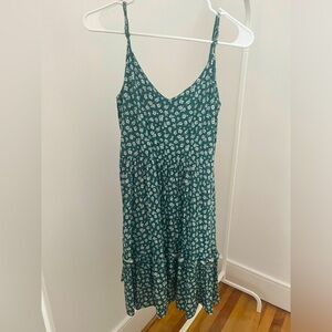 Green Hawaiian flowers dress with little ruffles at the bottom mid thigh dress